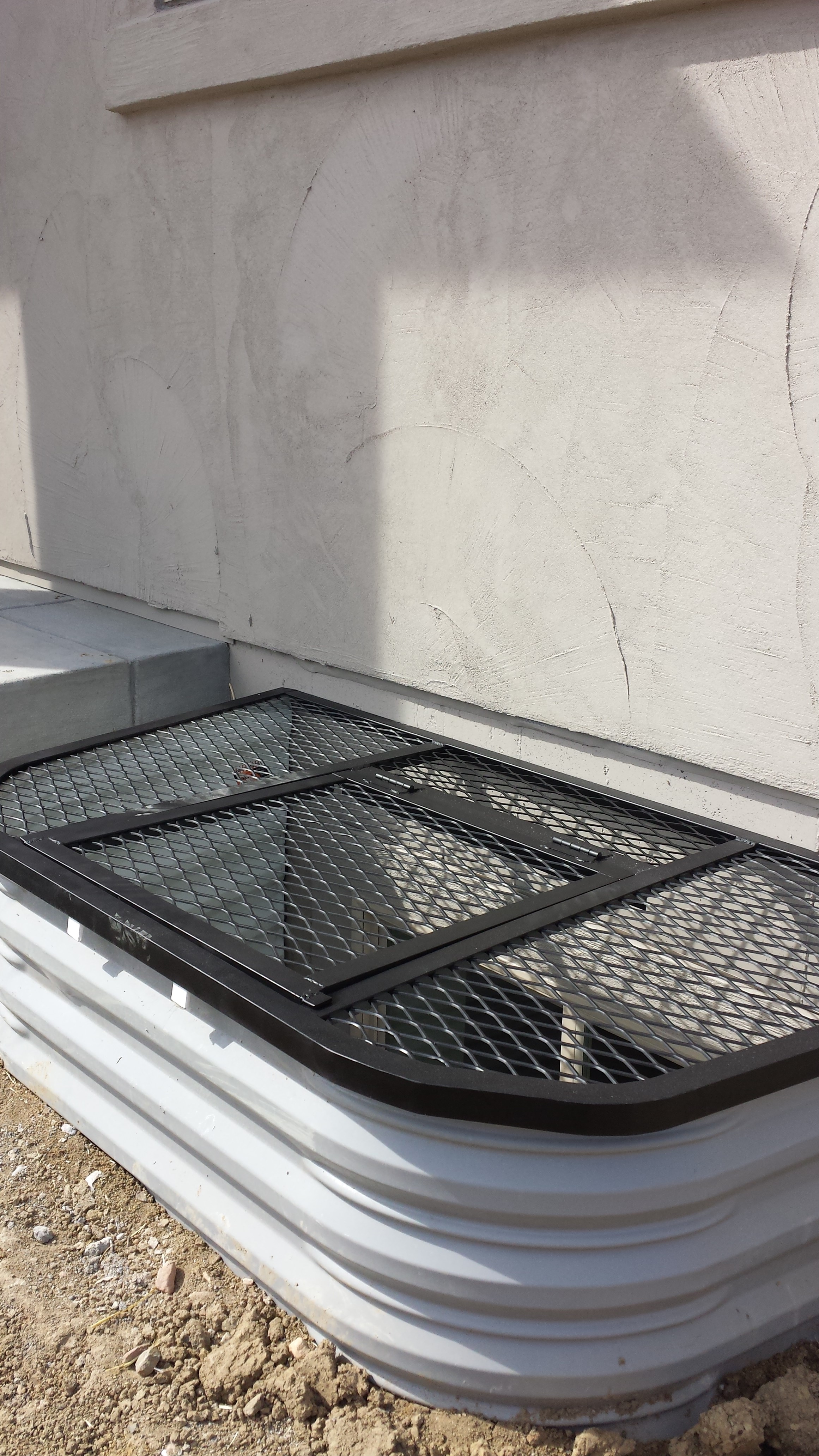 Metal window wells